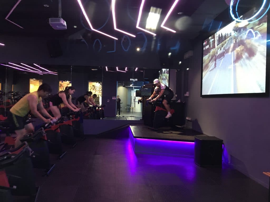Don Chan running a class at Cycology