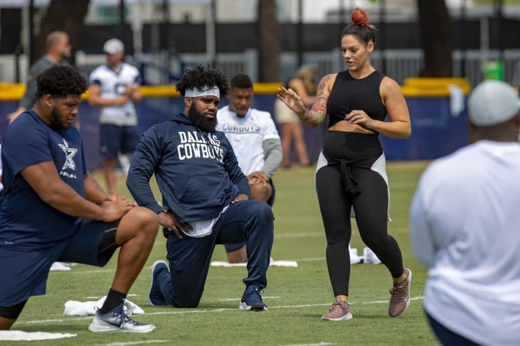 Dallas Cowboys NFL team doing yoga